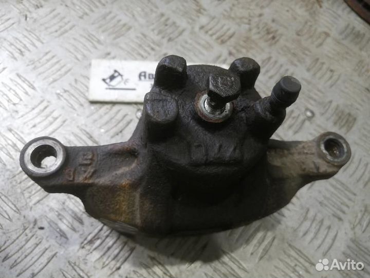 Суппорт передний левый Mitsubishi Lancer X