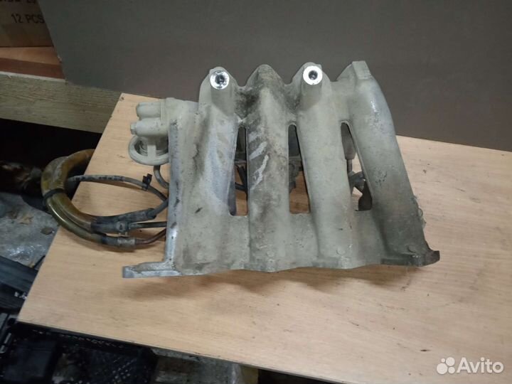 Впускной коллектор Mitsubishi carisma митсубиси