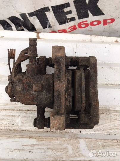 Суппорт тормозной задний левый Ford Mondeo 4