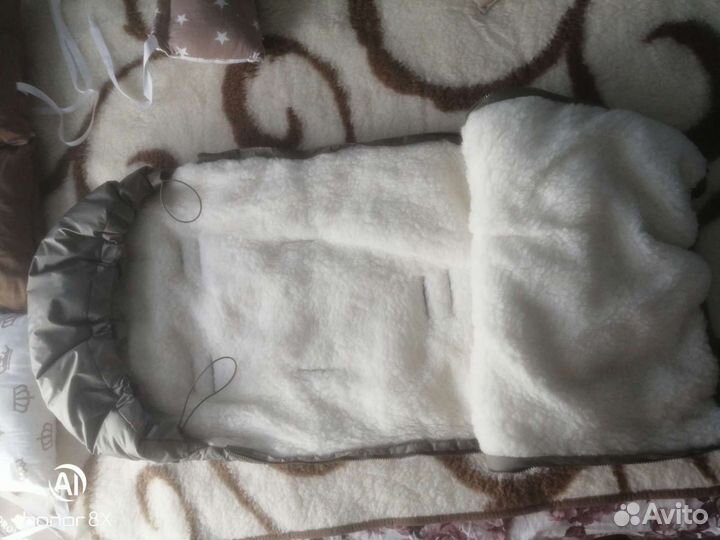 Меховой конверт в коляску