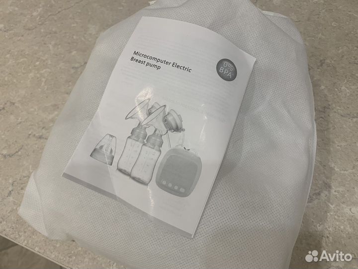 Электрический молокоотсос