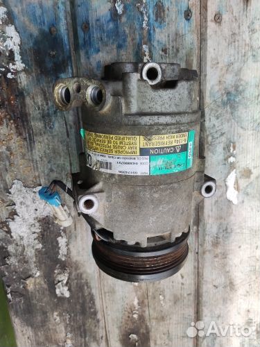 Компрессор кондиционера 9174396 Опель Астра G