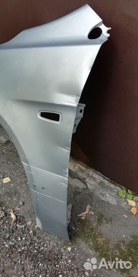 Переднее левое крыло lancer 10