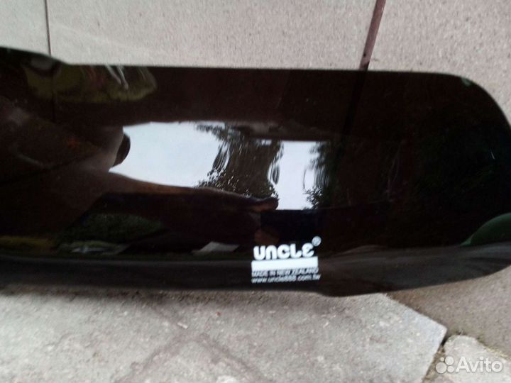 Дефлектор капота и очки фар Mitsubishi Pajero