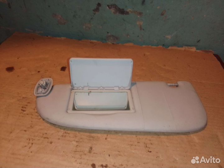 Солнцезащитный козырек левый Peugeot 206