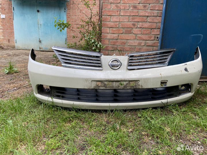 Передний бампер nissan tiida latio