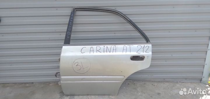 Дверь зад левая б/у Toyota Carina AT211 1996-2001