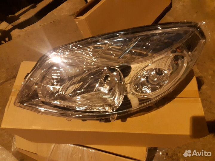 Фара левая Renault Sandero -14