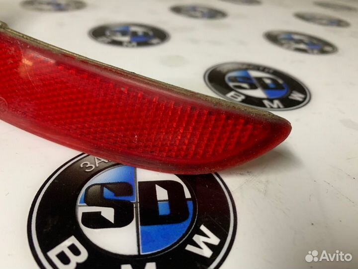 Отражатель бампера правый BMW F07