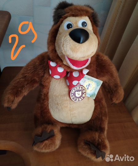 Медведь игрушка и фоторамка