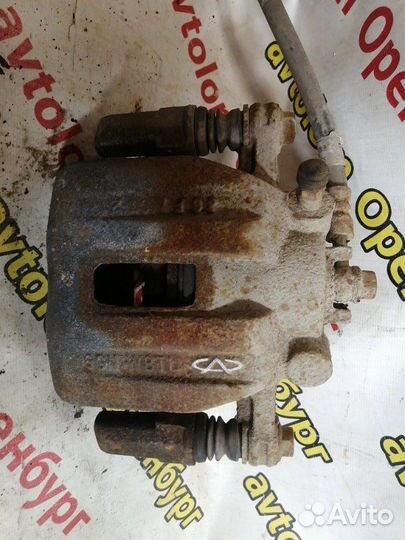 Суппорт тормозной передний правый Chery Indis