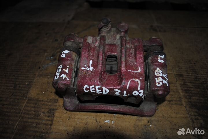 Суппорт задний левый киа сид 2007- 2012