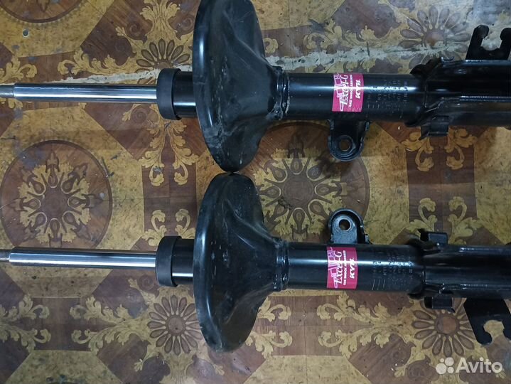 Стойки передние Kia sportage 3