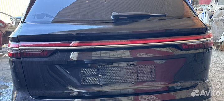 Фонарь в крышку банажника Geely Monjaro 23г