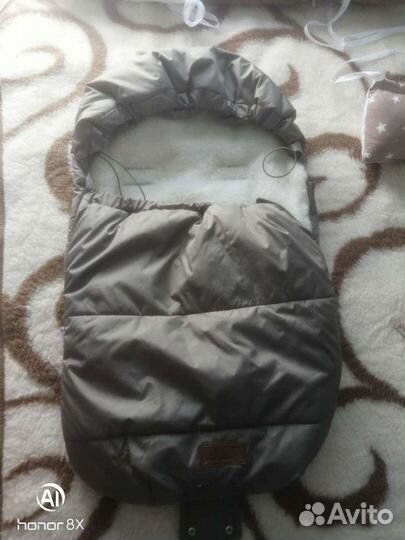 Меховой конверт в коляску