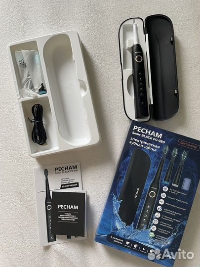 Электрическая зубная щетка