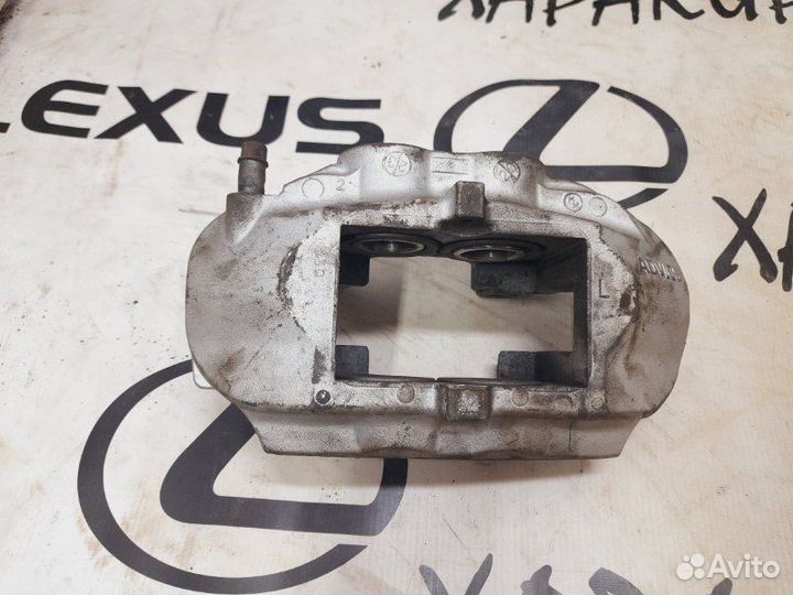 Суппорт тормозной передний левый Lexus Ls460