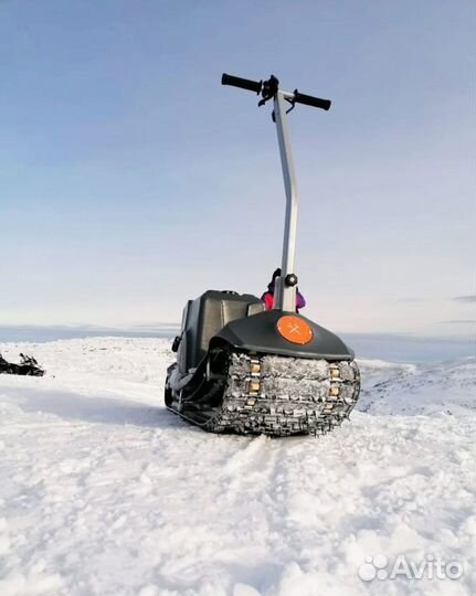 Мотосноуборд гусеничный