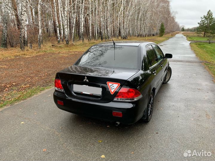 Mitsubishi Lancer 1.6 МТ, 2006, 195 000 км