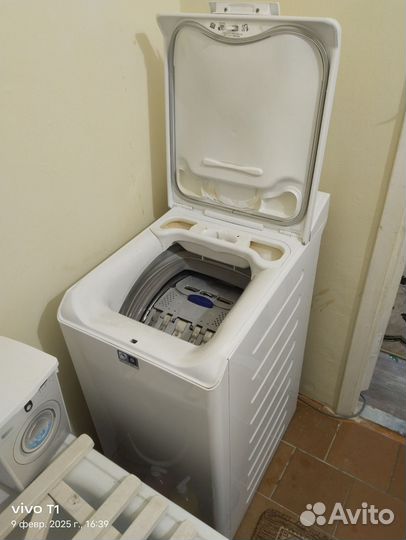 Стиральная машина с вертикальной загрузкой