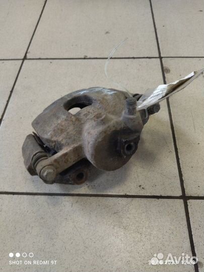 Суппорт тормозной передний правый Skoda Rapid 1