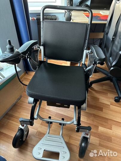 Электрическая инвалидная коляска