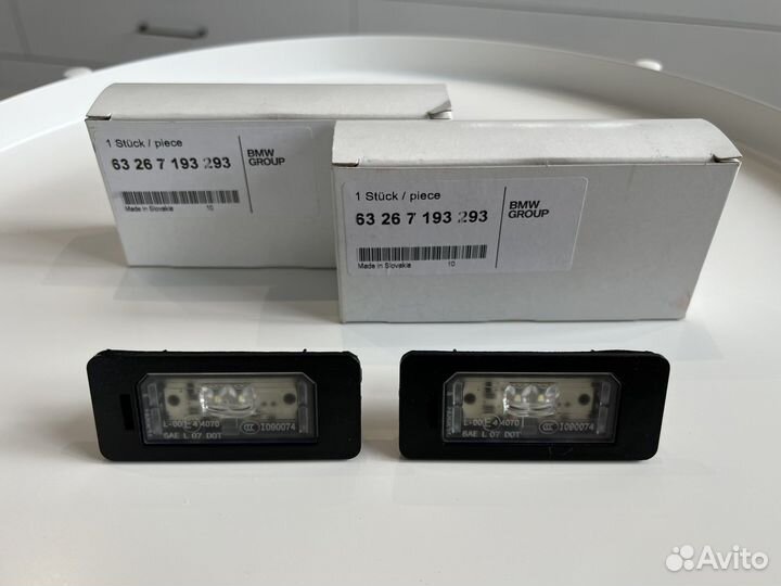 Фонарь подсветки номера BMW