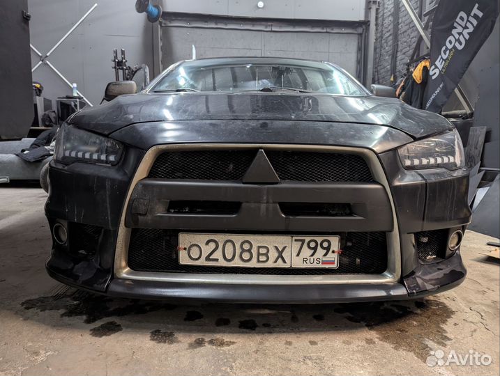 Бампер передний Lancer 10