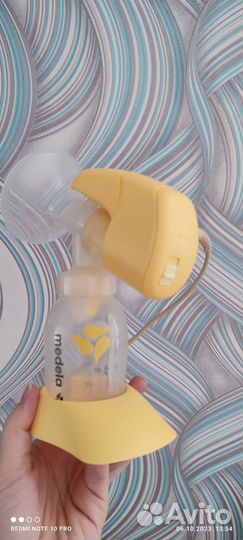 Молокоотсос medela электрический