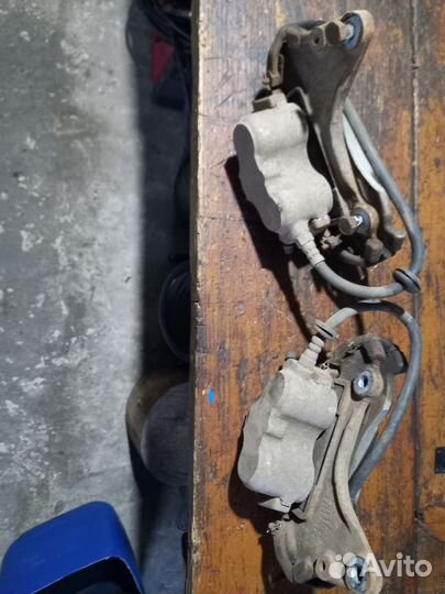 Суппорта в сборе нива 2121