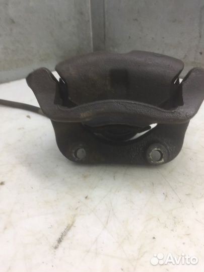 Суппорт передний правый Renault Logan седан 1.6