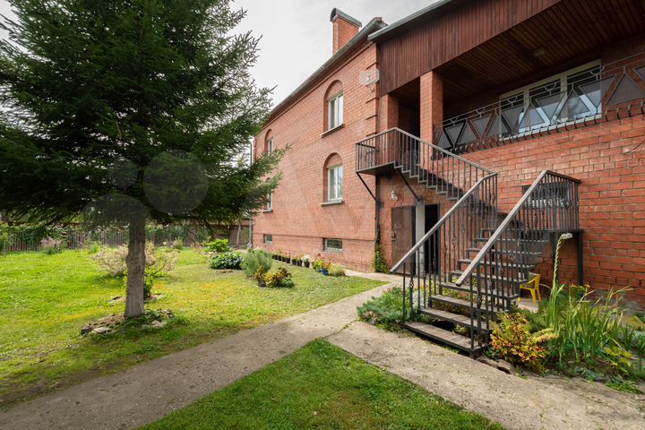 Коттедж 365 м² на участке 15 сот.