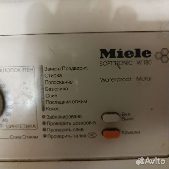 Стиральная машина с вертикальной загрузкой Miele