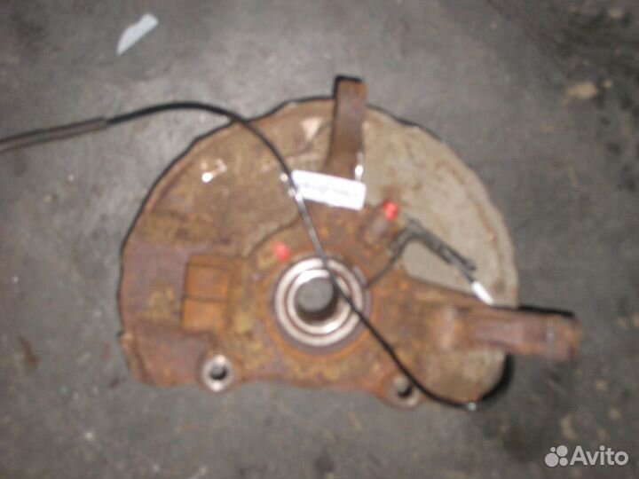 Поворотный кулак Mitsubishi Lancer 10