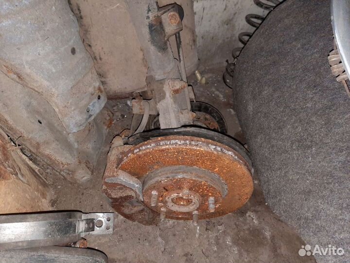 Стойка амортизатора левая галант 9