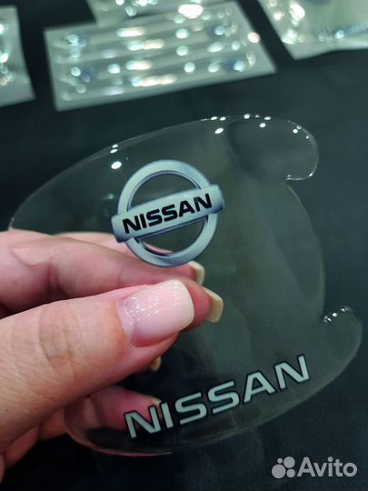 Защитные наклейки под ручки авто Nissan