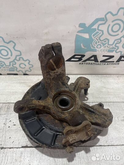 Кулак передний левый Volkswagen Polo 5