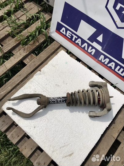 Передняя левая стойка в сборе Волга Сайбер