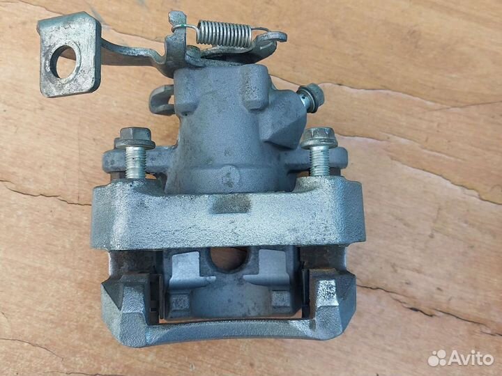 Суппорт тормозной задний тойота королла 150