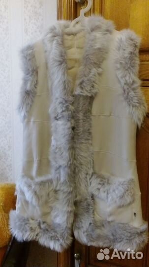 Жилеты теплые женские