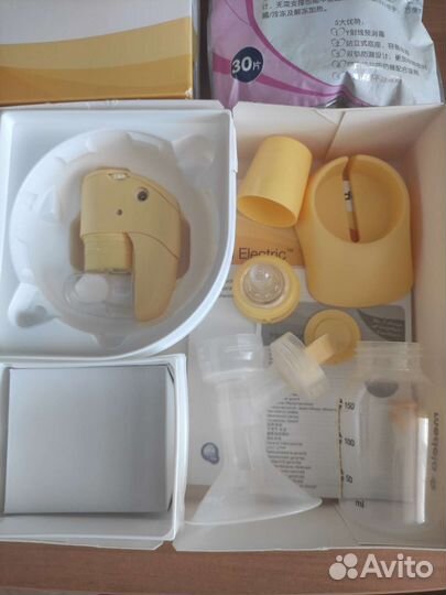 Молокоотсос medela электрический