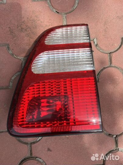 Фонарь задний на ленд крузер-100.Оригинал