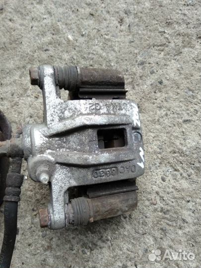 Задний суппорт Шевроле лачетти Chevrolet Lacetti