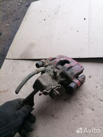 Суппорт Nissan Primera P12 задний левый