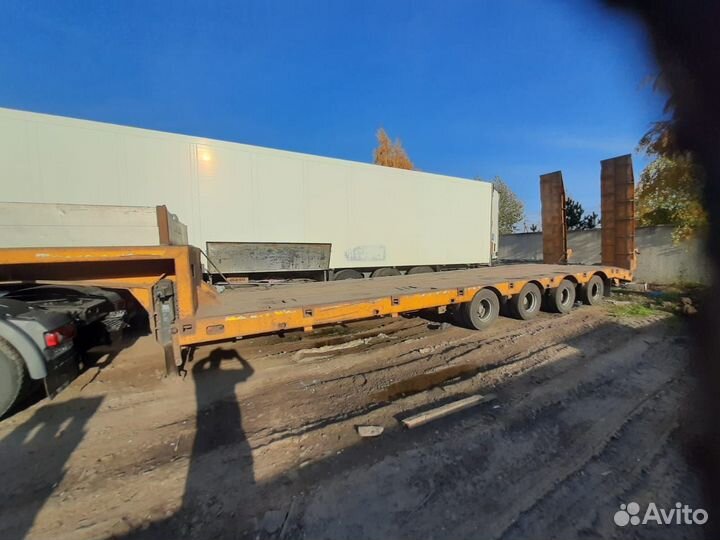 Полуприцеп трал (тяжеловоз) Политранс ТСП 94184, 2011