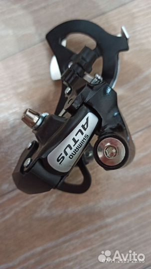 Переключатель задний Шимано альтус