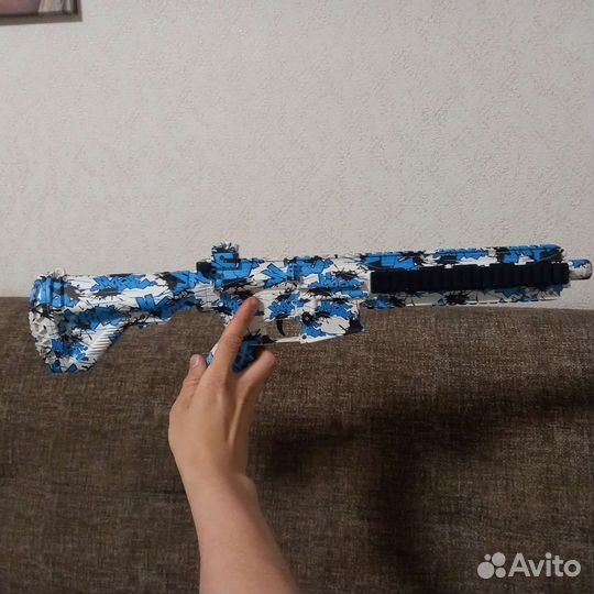 Игрушечный автомат с орбизами