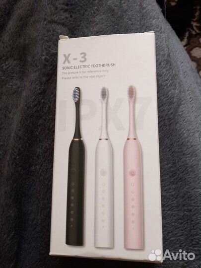 Электронная зубная щетка