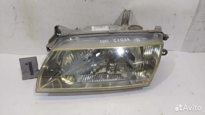 Фара mazda 100-61824 L Familia BH 97-99 хруст