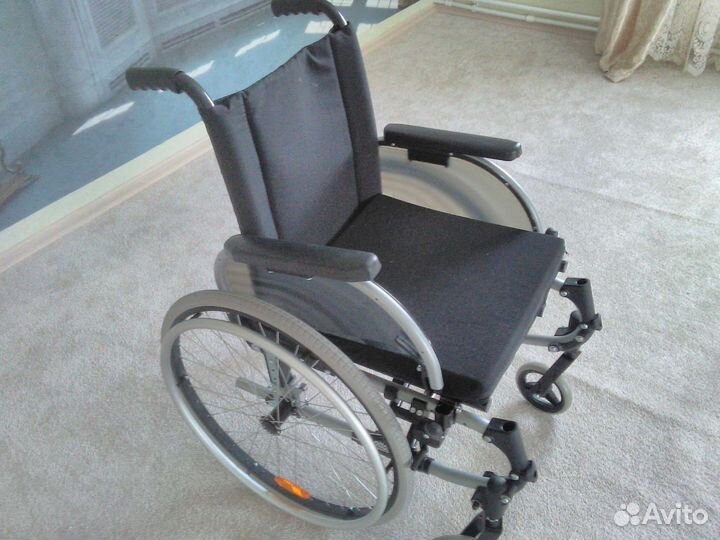 Инвалидная коляска